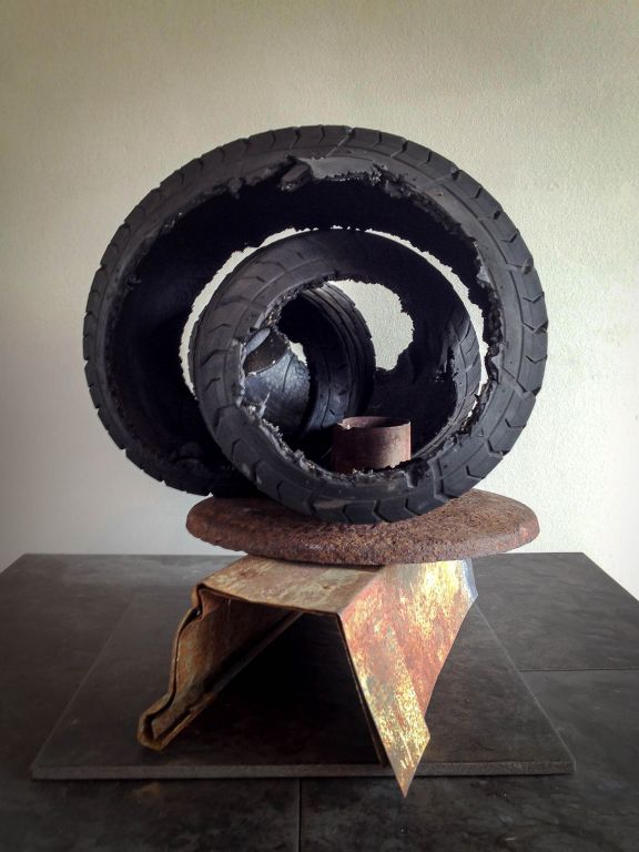 Twist left side view, altered tire piece and metal, 14"H x 20"W x 12"D
